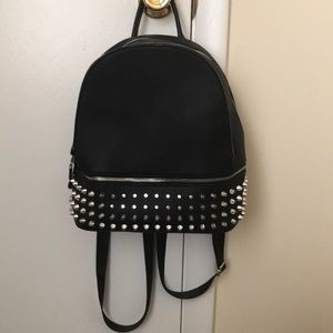 Black and silver book bag with silver studs